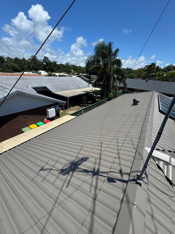 A grey metal roof after a full clean and recoat