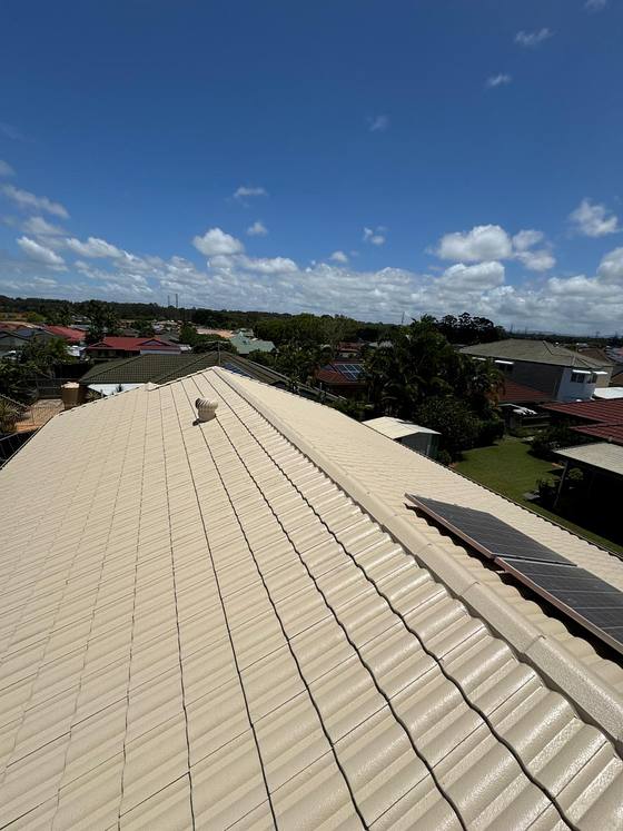 A cream tile roof running up to the ridge